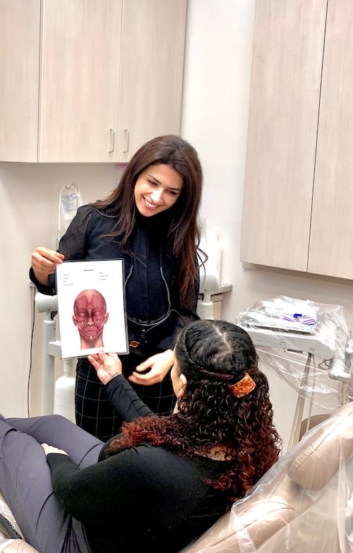 Dr. Mahi Mehr Consults our Lincoln Park and South Loop Patient on Cosmetic Dental Treatment Dr. Mahi Mehr discussing cosmetic dental treatment with a patient at DentalQ in Lincoln Park and South Loop areas of Chicago.