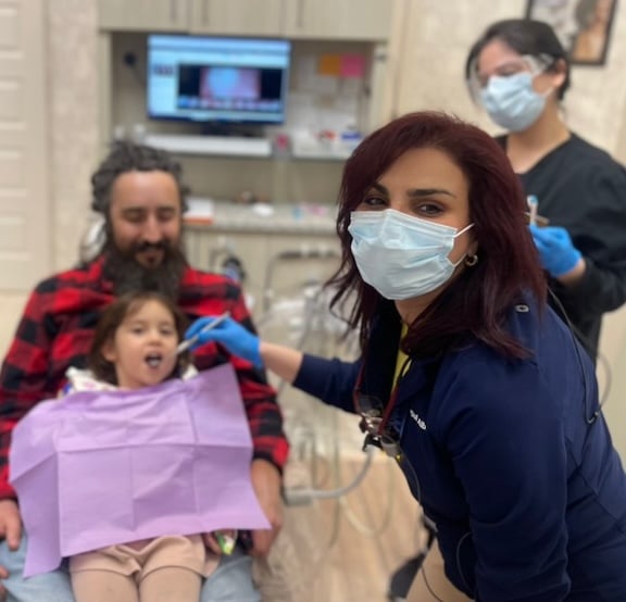 Compassionate Pediatric & Family Dentistry – Dr. Rusul Albazi Dr. Rusul Albazi providing gentle, compassionate pediatric dental care at DentalQ in Chicago’s Lincoln Park location.